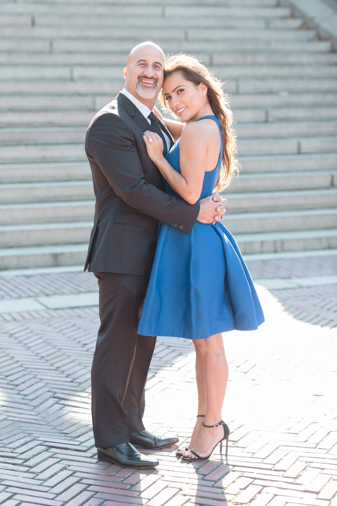 A man and woman posing for a picture.